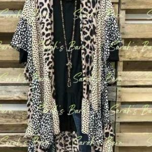 New without tags Small (more like medium) cover-up